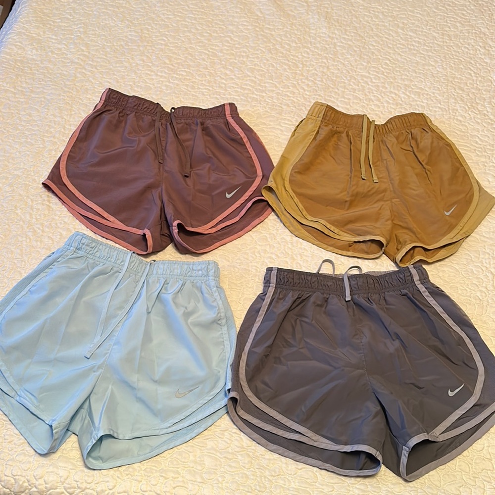 Nike women’s running shorts (4 pairs all XS)